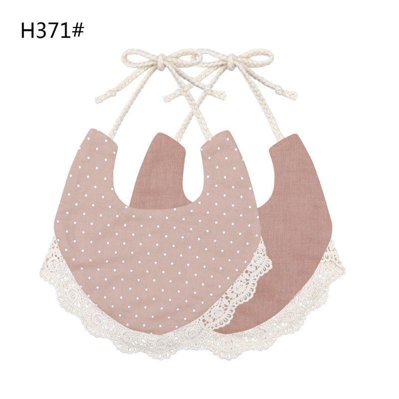 The Deux Tassel Bib