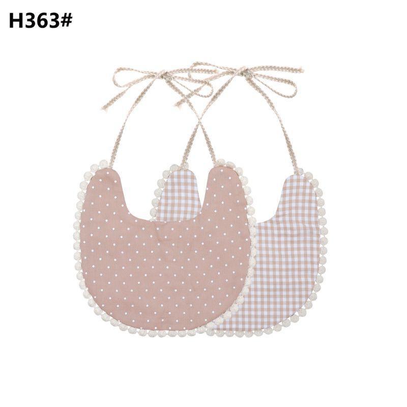 The Deux Tassel Bib