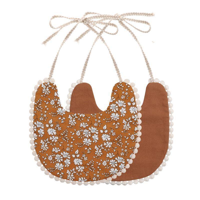 The Deux Tassel Bib