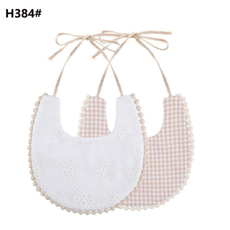The Deux Tassel Bib
