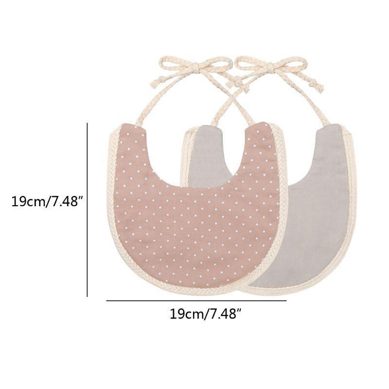 The Deux Tassel Bib