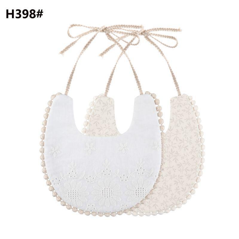 The Deux Tassel Bib