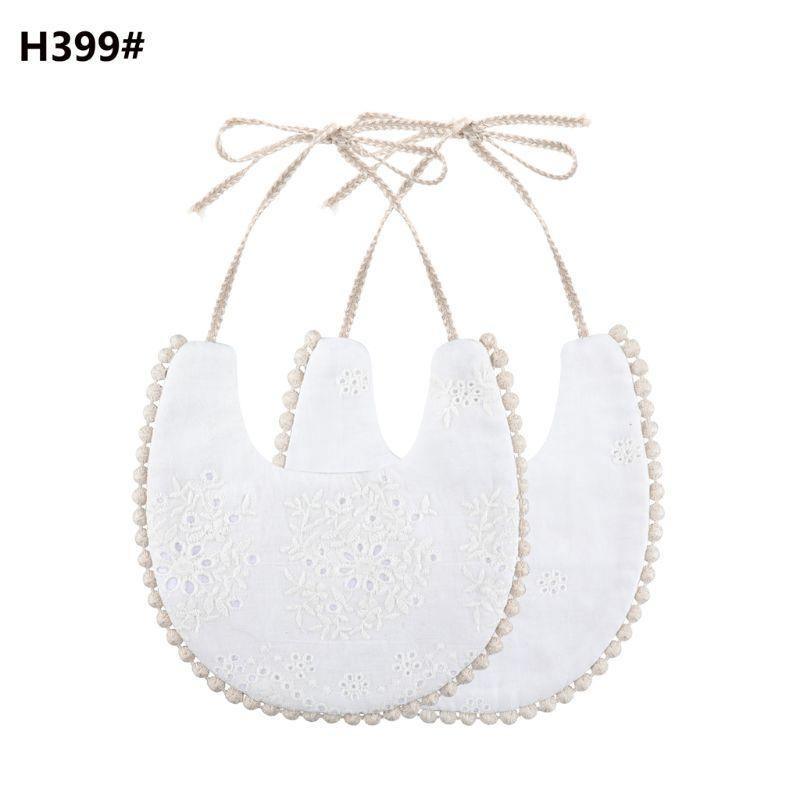 The Deux Tassel Bib