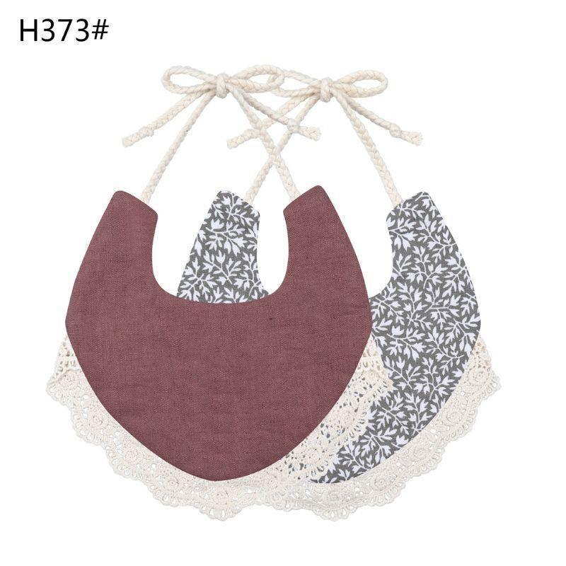 The Deux Tassel Bib