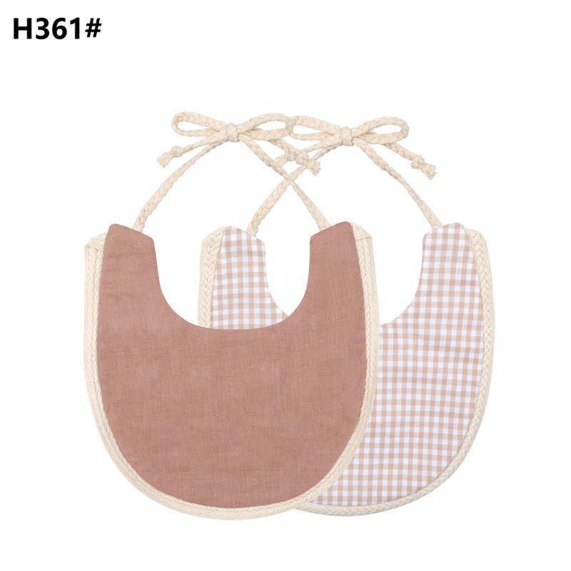 The Deux Tassel Bib
