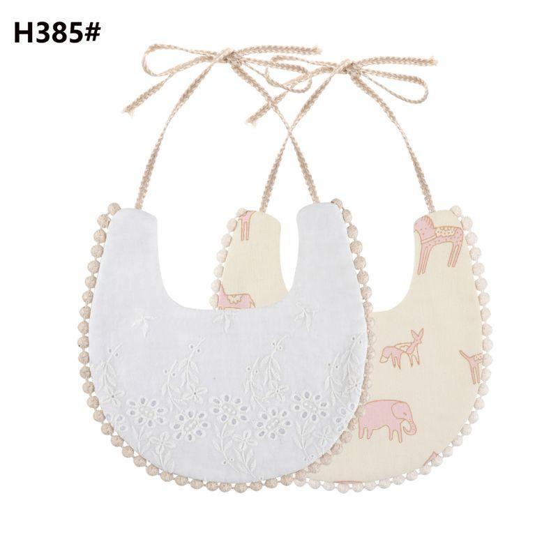 The Deux Tassel Bib