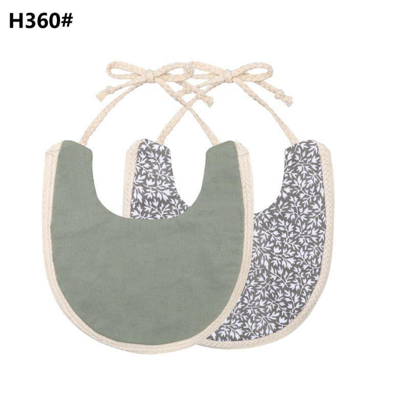 The Deux Tassel Bib