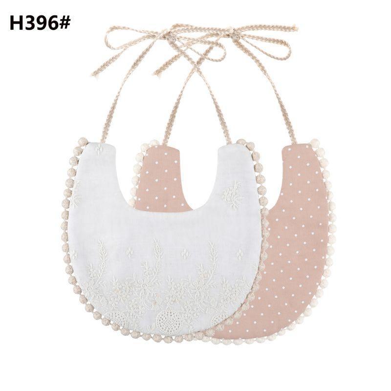 The Deux Tassel Bib