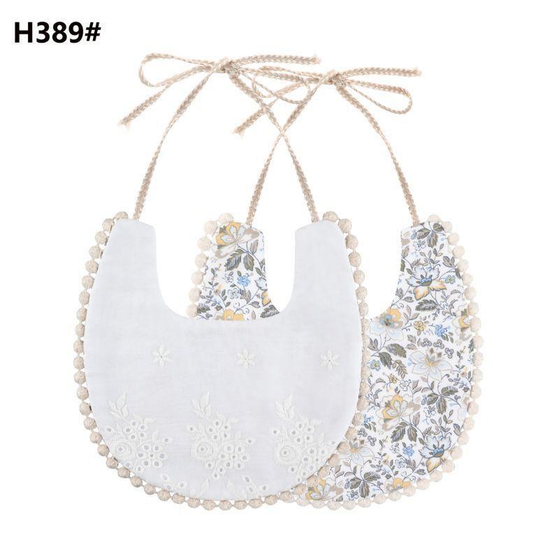 The Deux Tassel Bib
