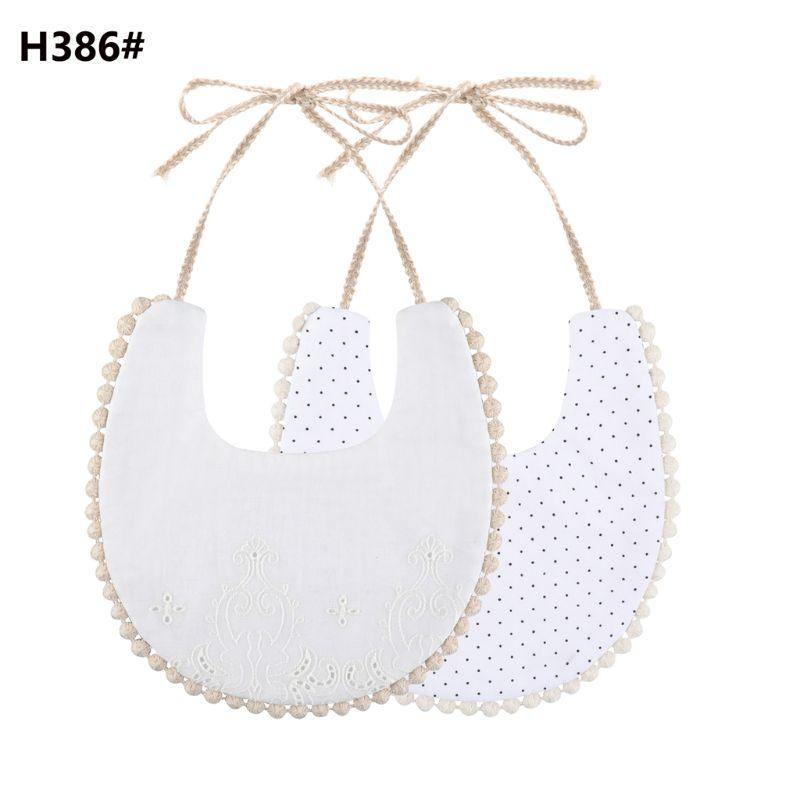 The Deux Tassel Bib