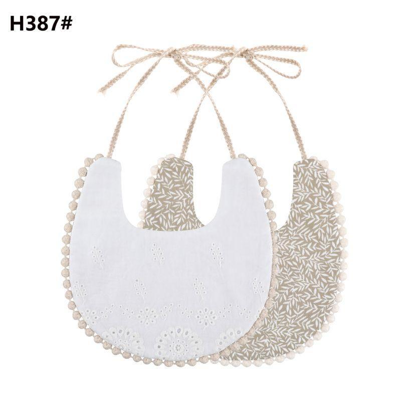 The Deux Tassel Bib