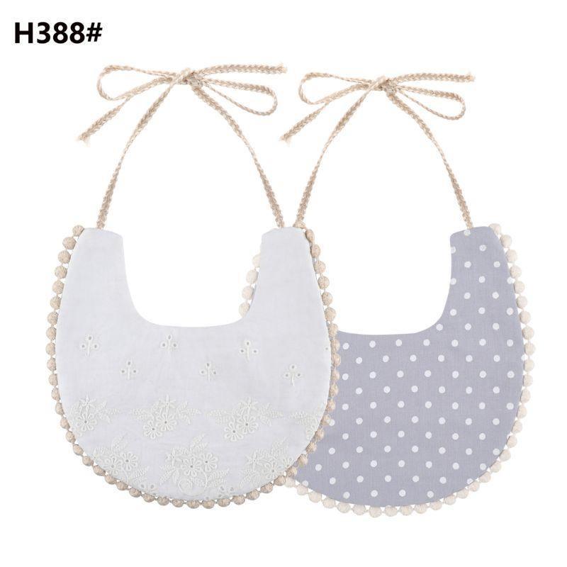 The Deux Tassel Bib